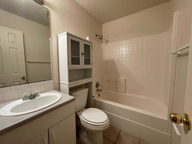 Full bathroom with washtub / shower combination, b