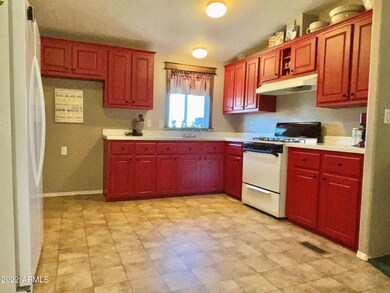 Kitchen with beautiful barn red cabinets