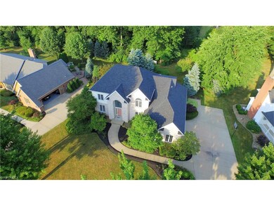 Ariel view of grounds and newer roof and large dri