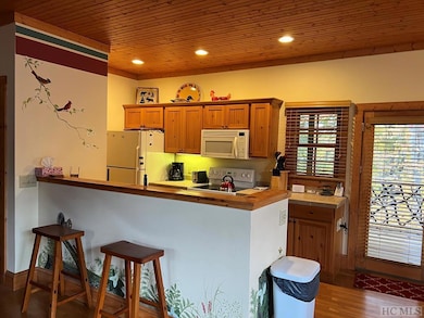 Kitchen with bar stools included