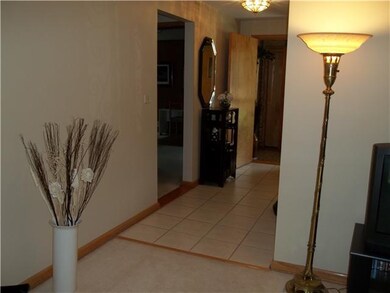 Other. Front hall leading into living room with be