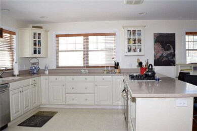 Kitchen open to living area on the...