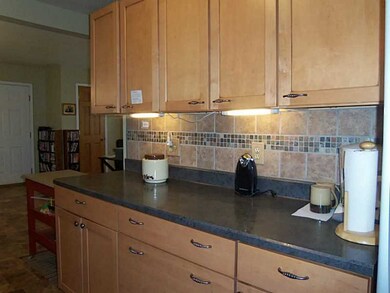 Kitchen. Sharply Updated with Custom Tile