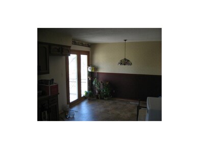 Dining room and back door leading to upper deck!