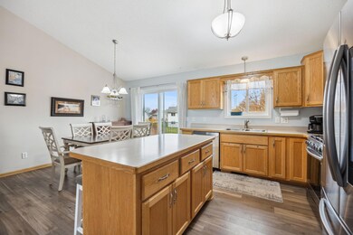 The open design from the kitchen through the dining room that is also open to the living room is very inclusive allowing everyone to spend time together!