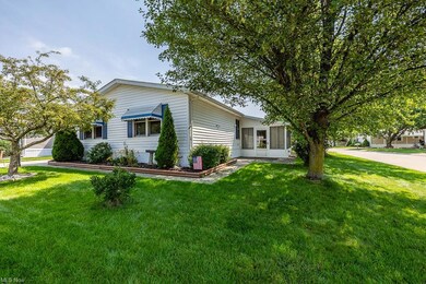 View of front of house featuring a front lawn