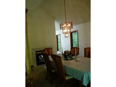 Dining Room. Enjoy the vaulted ceiling and marble 