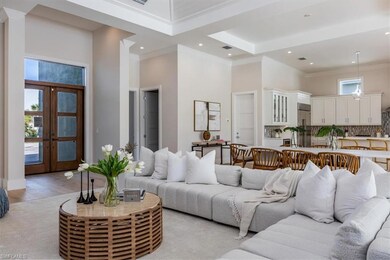 The open concept main living area features a vault