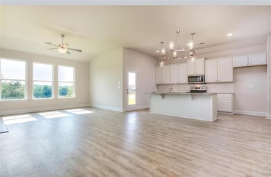 Kitchen with a kitchen breakfast bar, range, an is