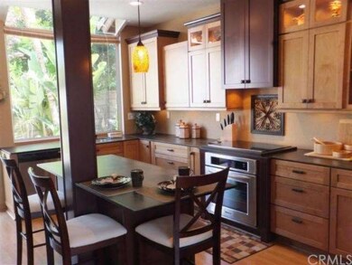 Gourmet kitchen was remodeled with KraftMaid Cabin