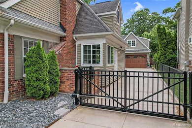 Gate securing rear yard, garage and carriage house