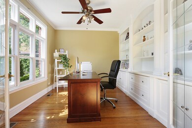 Main floor office with double french doors and cus