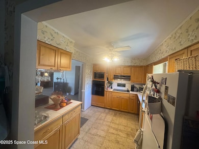 2565 Shady Oaks Dr, Titusville, FL 32796 - photo 3