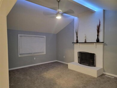 Large family room just off the kitchen on the main level.  Vaulted ceiling, fireplace and opens to the large, oversized deck.