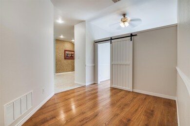 space with barn door for office or playroom