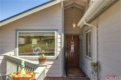 Entry door with large dual pane window.