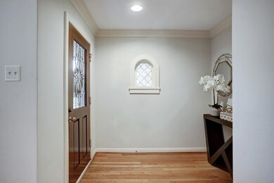 Step into your cozy retreat with warm wood floors