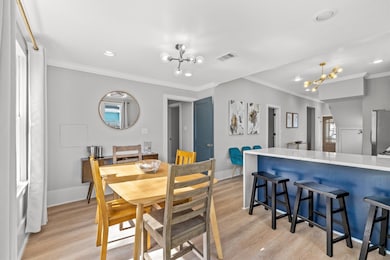 The dining room is located adjacent to the kitchen