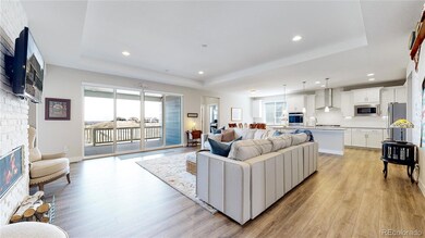 a GREAT room, opens to kitchen and patio, gas fire place, laminate plank floor