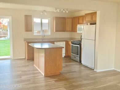 Kitchen Open to Dining and Living Areas