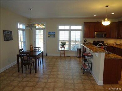 Large Open Kitchen With Dining Area.