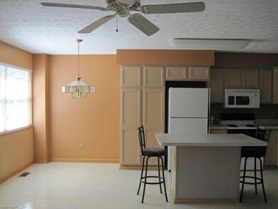 Dining area off the kitchen; window offers view of