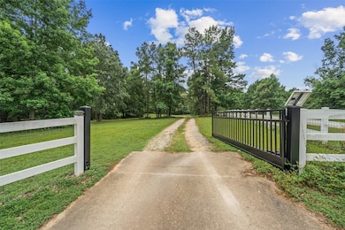 Grand entrance to this gorgeous 10 acre+ property