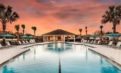 Outdoor pool at sunset