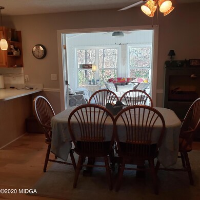 Eat in Kitchen view to Sun Room