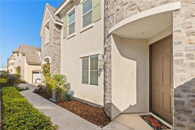 Enchanting French Tudor Style townhome is move-in ready, centrally located, and has a private end unit location.