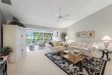 Living room featuring high vaulted ceiling, ceilin