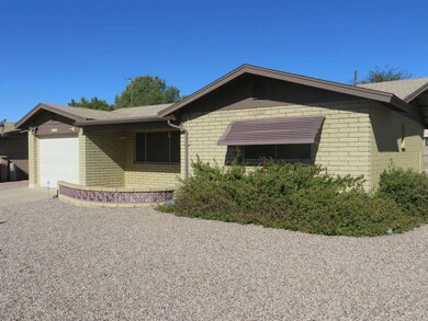 Front of home with landscaping