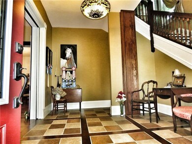 Grand Foyer. Ceramic and Wood Tile create a custom