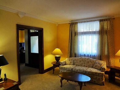 Living Room. The living room features a large wind