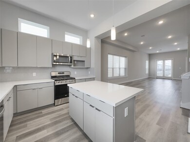 Open concept kitchen to living room.