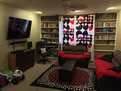 SUNKEN LIVING ROOM * BUILT-IN SHELVING