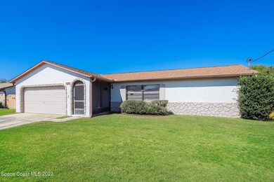 1298 Robbinswood Dr, Rockledge, FL 32955 - photo 2