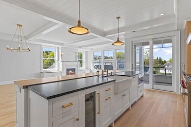 Central Island complete with wine cooler, dishwash