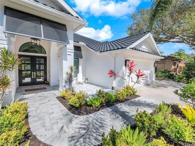 Doorway to property featuring french doors, a tile