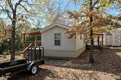 Covered decks on both front and back of home.