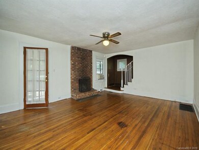 Living room leading to the upstairs