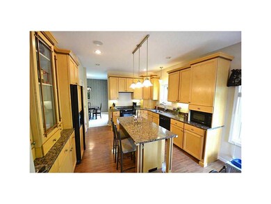 Kitchen. Maple cabinets w/walnut inlay and granite