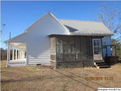 View of the right end of home shows the screened a