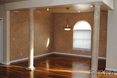 Formal dining room. Gorgeous walnut flooring with 
