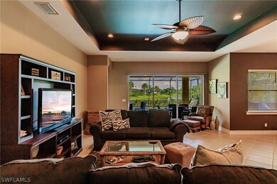 View from family room to lanai and lake add to the