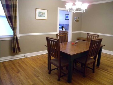 Dining Room. CROWN MOULDING AND CHAIR RAIL ENHANCE