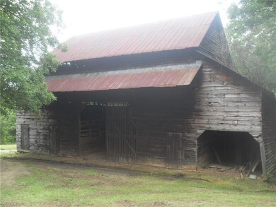 This is an amazing 3 level barn with stalls. This barn is built with hand hewed  beams and built to last.