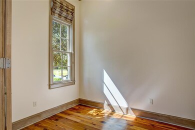 Office with double doors off the foyer