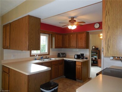 Kitchen with newer appliances, is open to the fami