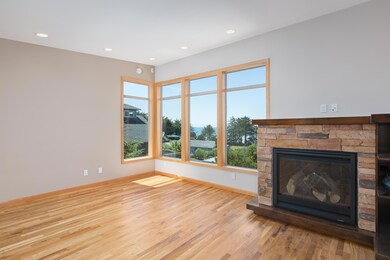 Fireplace and Large Windows.
